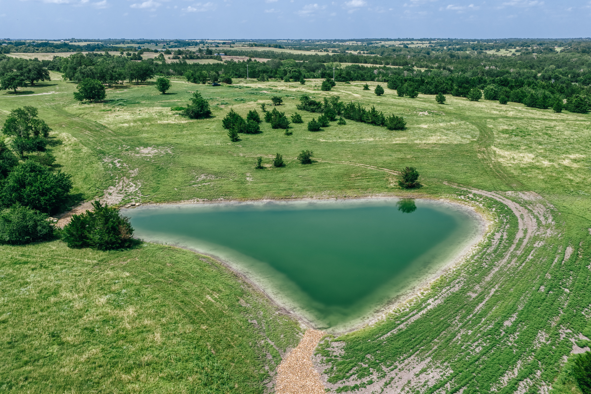 Aerial of Lot 4 pond and surrounding pasture