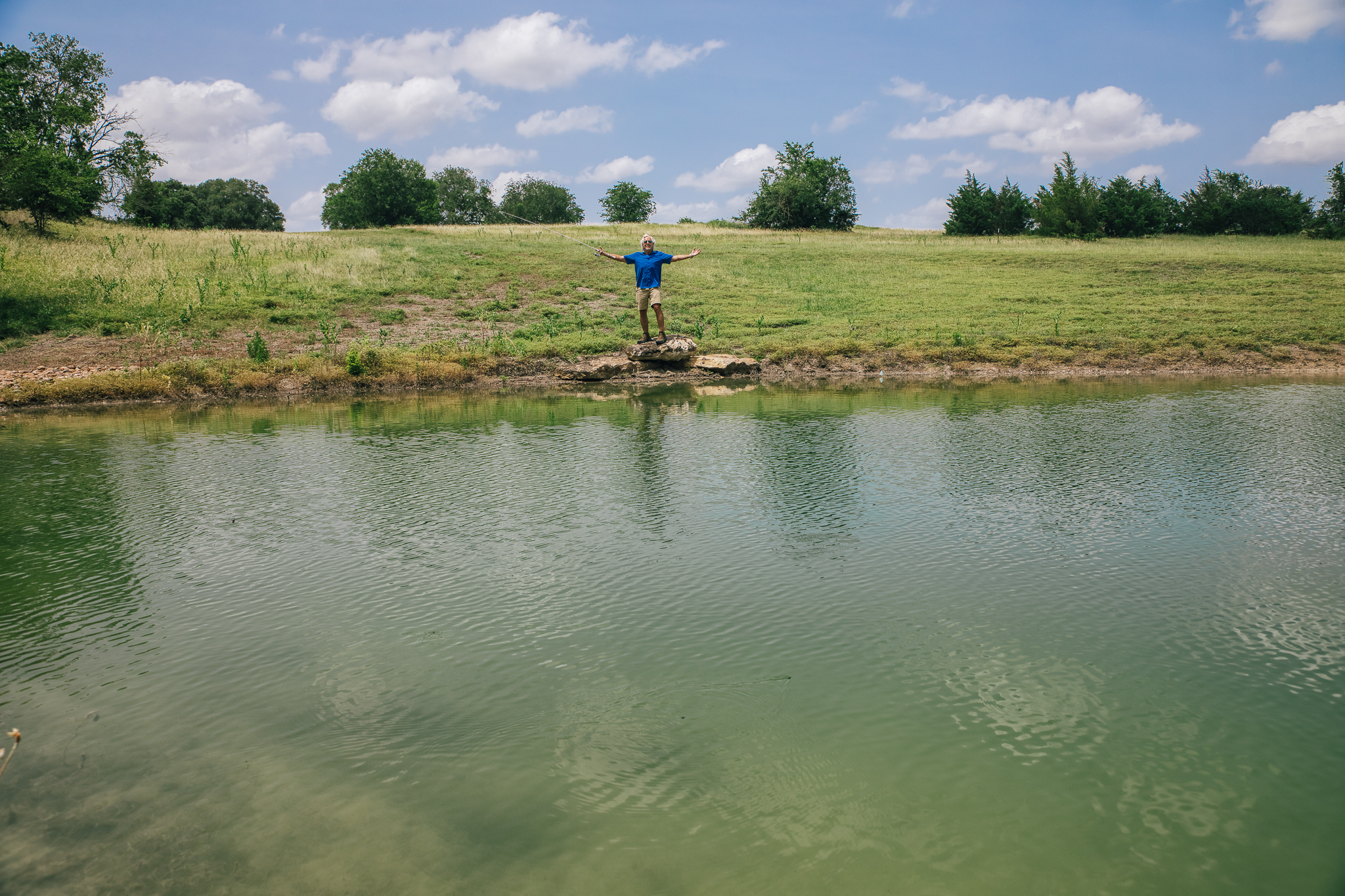 Man fishing at pond — Lot 4